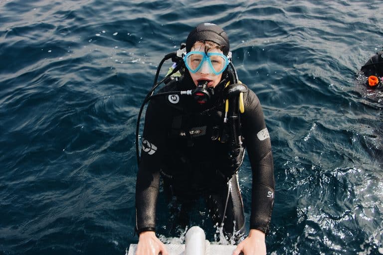 What scuba course should you do? Man learning to scuba dive