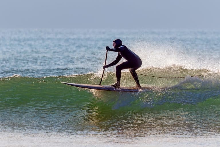 Can You Surf on a Paddleboard? Yes. But is it Easy?